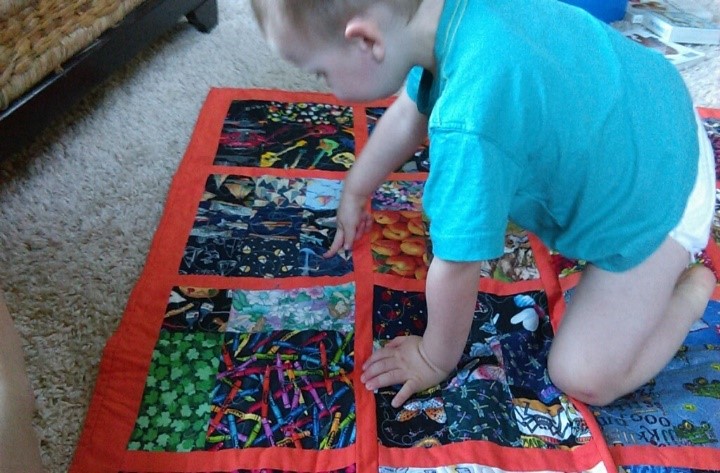 Child with Quilt